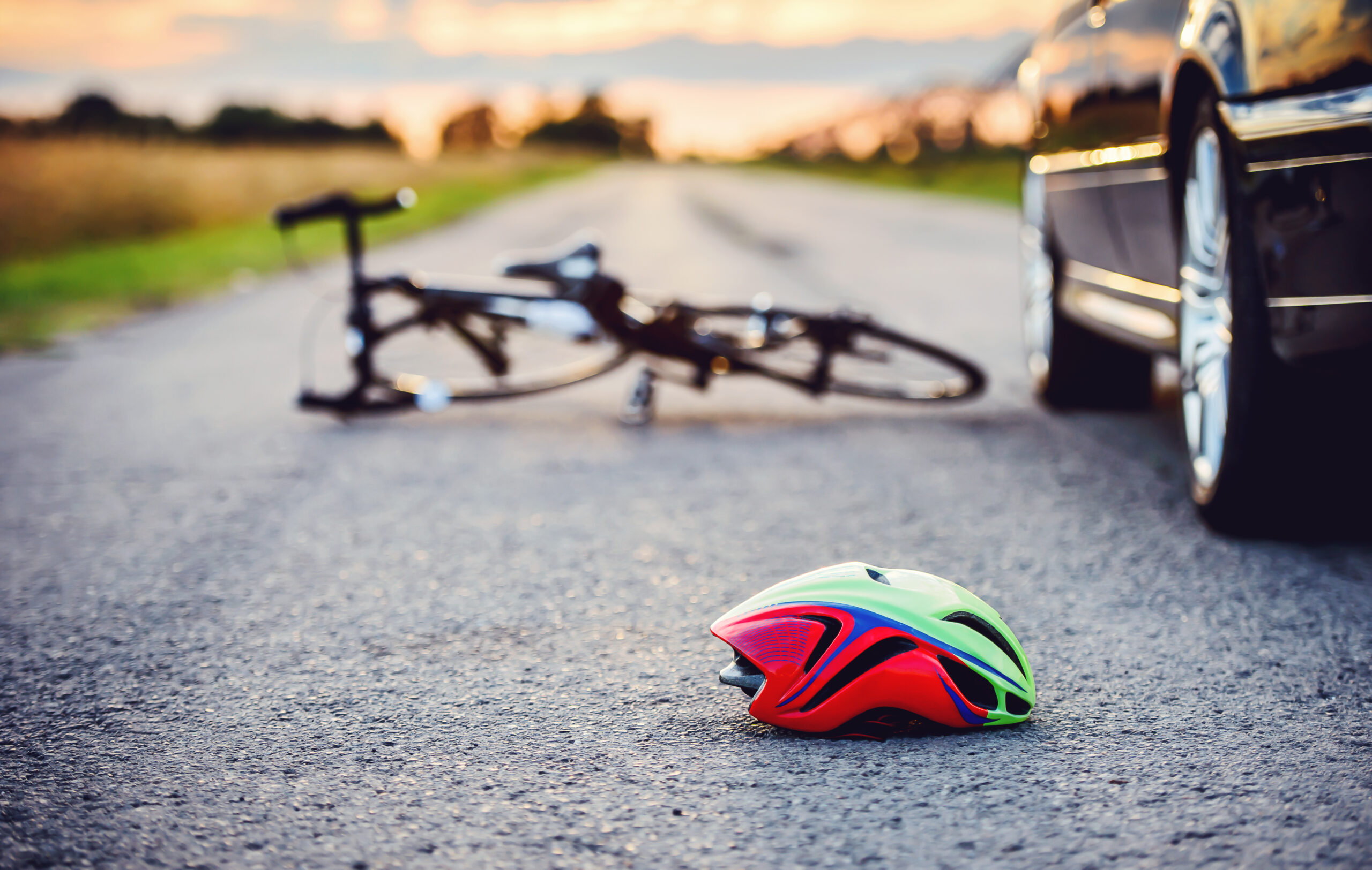 Traffic accident between bicycle and car. Bicycle accidents are dangerous.